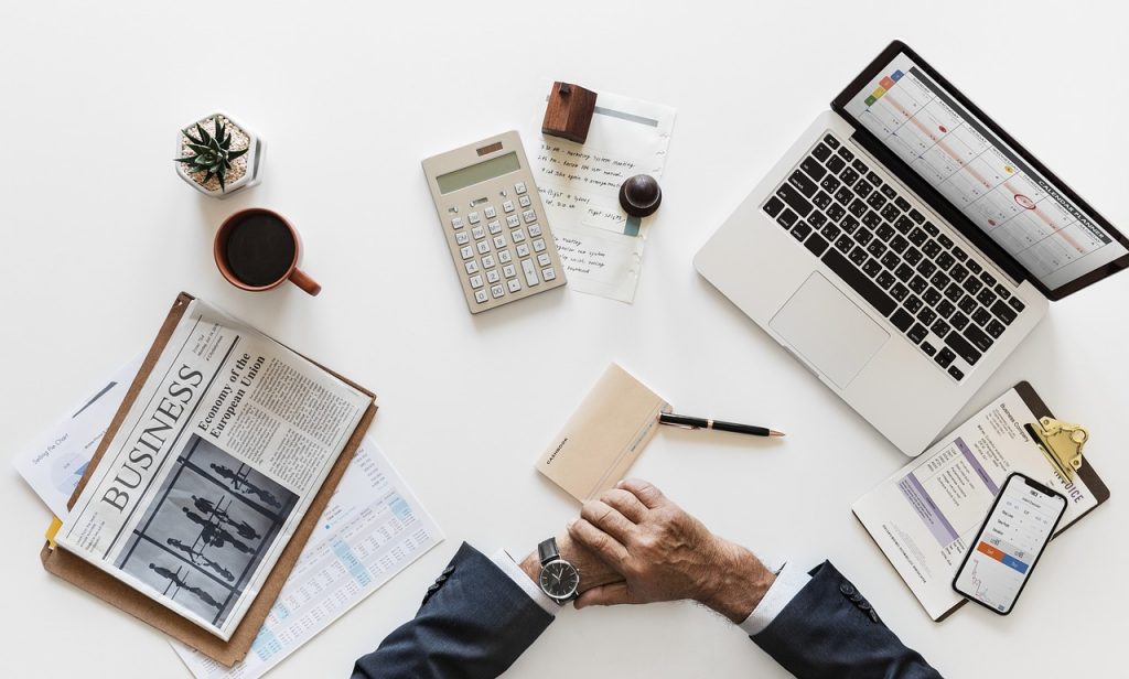 Small business owner reviewing payment options